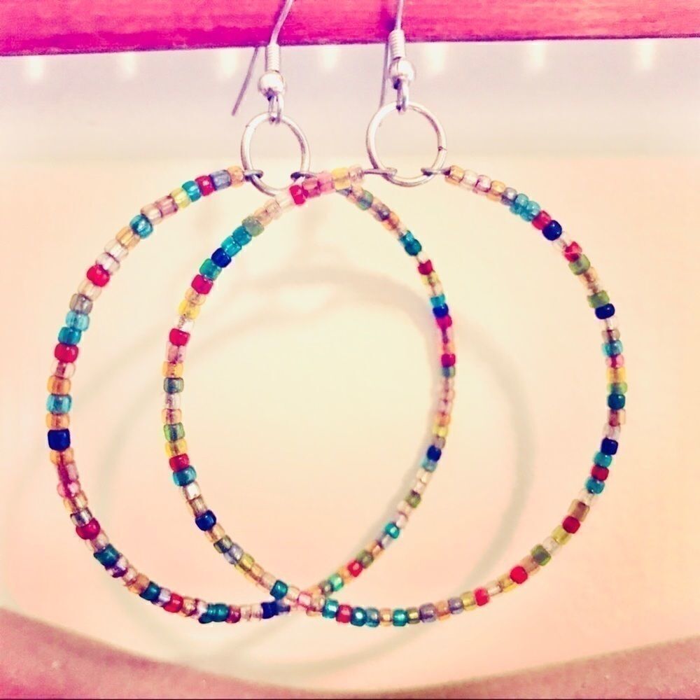 NAKED HANGER small rainbow beaded hoops.